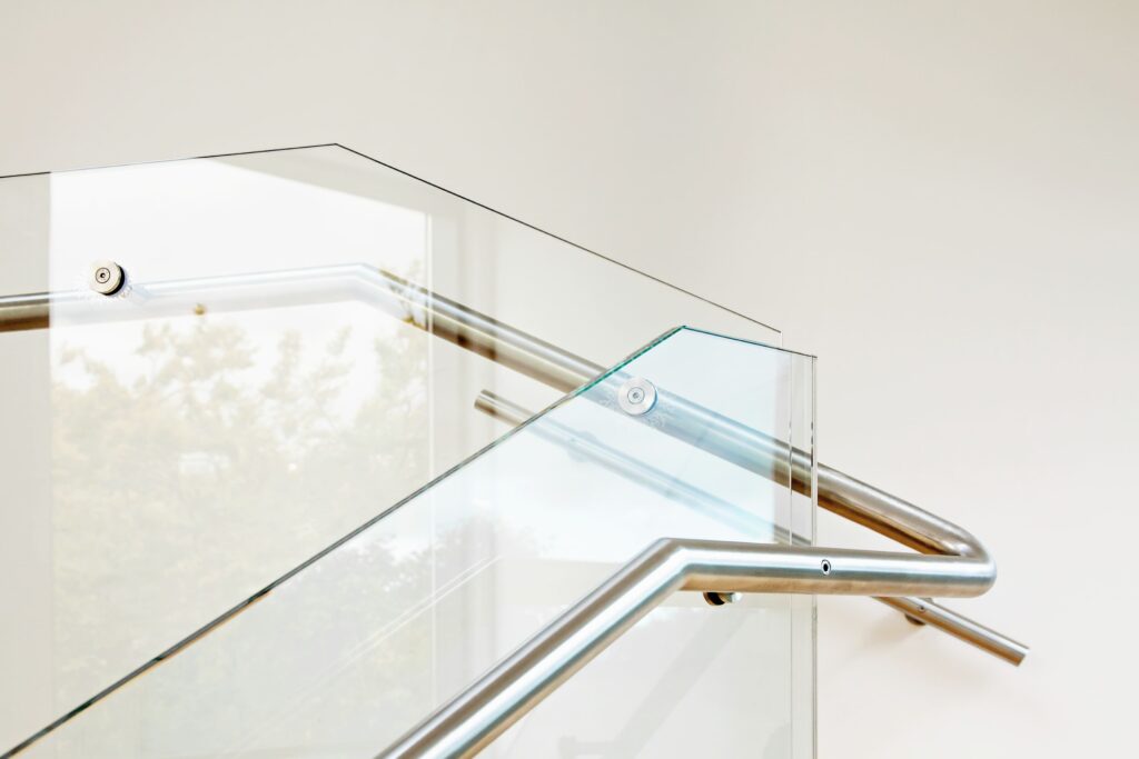 maintenance difference between framed and frameless glass railings