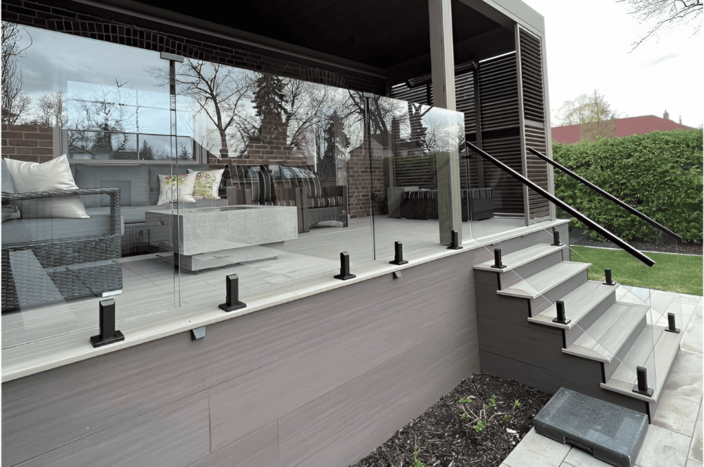 Regular glass railing maintenance helps protect posts and panels, keeping patio stairs safe and looking well cared for