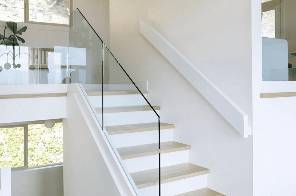 Glass railing contractor in Seattle reviewing a detailed project timeline with a homeowner during the consultation process
