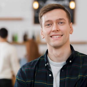 portrait-cute-smiling-boy-cafe